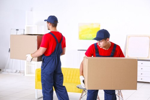 Furniture pick-up service handling a sofa collection in West Hampstead