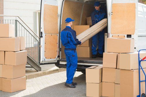Removal team managing a flat move in West Hampstead