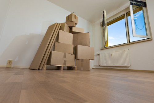Moving team handling a West Hampstead flat relocation on a residential street
