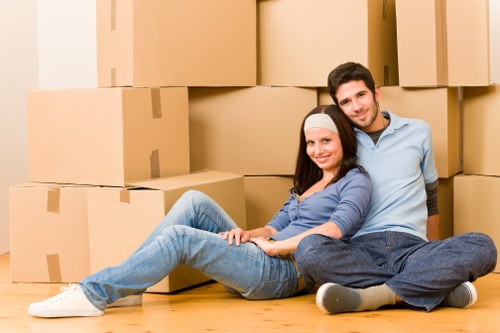 Unpacking boxes into a newly moved-in flat in West Hampstead