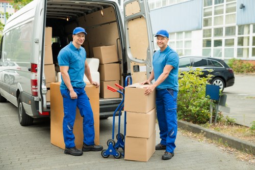 Careful wrapping of fragile household items during packing