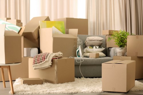 Furniture being carried from a West Hampstead flat with stair access